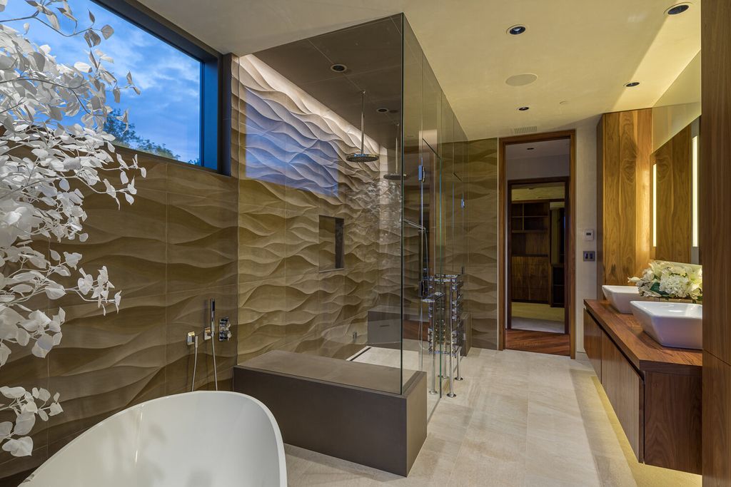 The Colorado Mansion is a modern architectural masterpiece is perched on a point featuring thrilling views of Telluride's most dramatic peaks now available for sale. This home located at 296 Gray Head Ln, Telluride, Colorado; offering 6 bedrooms and 10 bathrooms with over 11,800 square feet of living spaces.