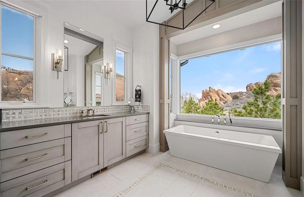 The Modern Farmhouse in Colorado is beautifully designed to maximize the expansive landscape set amidst the iconic Red Rocks now available for sale. This home located at 10655 Leonardo Pl, Littleton, Colorado; offering 4 bedrooms and 6 bathrooms with over 5,800 square feet of living spaces.