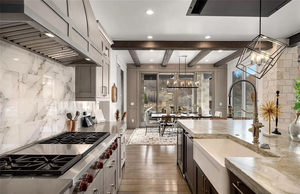 The Modern Farmhouse in Colorado is beautifully designed to maximize the expansive landscape set amidst the iconic Red Rocks now available for sale. This home located at 10655 Leonardo Pl, Littleton, Colorado; offering 4 bedrooms and 6 bathrooms with over 5,800 square feet of living spaces.