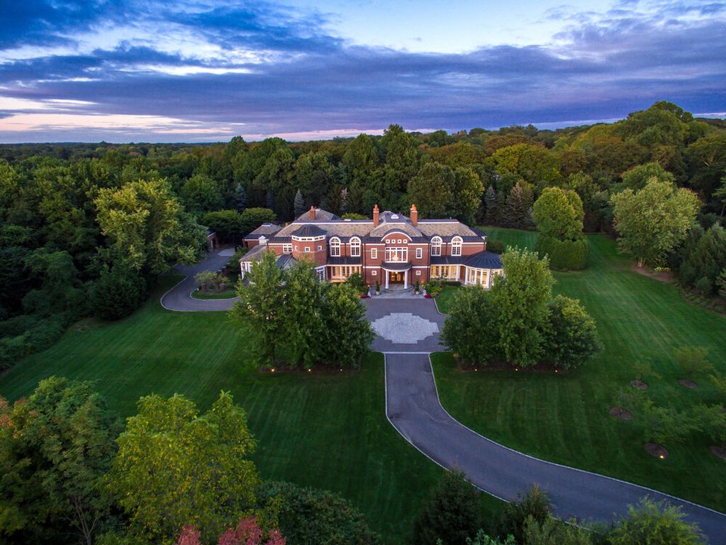 The New York Home is a perfectly manicured property located on one of the most prestigious streets on the Gold Coast of Long Island now available for sale. This home located at 110 Dupont Ests, Greenvale, New York; offering 7 bedrooms and 12 bathrooms with over 10,000 square feet of living spaces. 