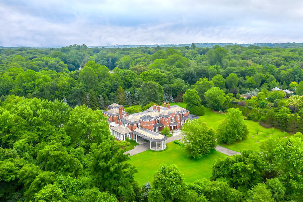 The New York Home is a perfectly manicured property located on one of the most prestigious streets on the Gold Coast of Long Island now available for sale. This home located at 110 Dupont Ests, Greenvale, New York; offering 7 bedrooms and 12 bathrooms with over 10,000 square feet of living spaces. 