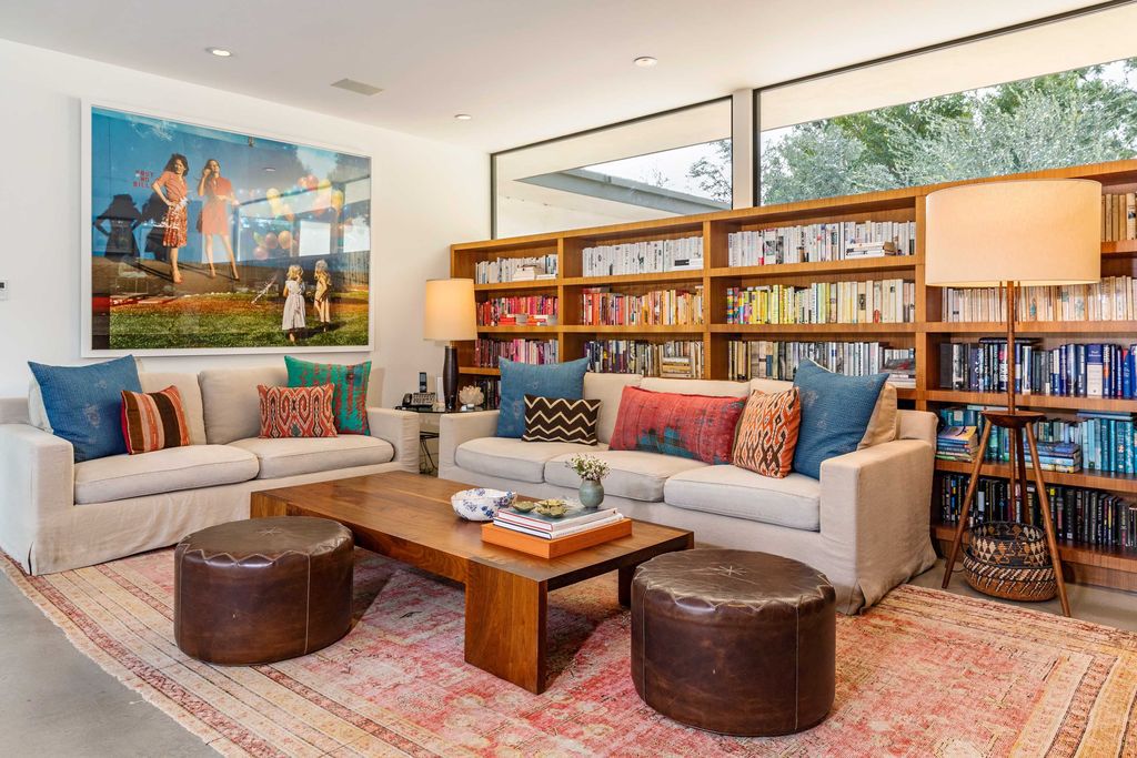 The Mid Century Home in Beverly Hills is a organic property offers total privacy, effortless indoor - outdoor living and unparalleled treetop views now available for sale. This home located at 1030 Woodland Dr, Beverly Hills, California; offering 4 bedrooms and 4 bathrooms with over 4,400 square feet of living spaces.