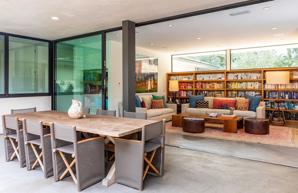 The Mid Century Home in Beverly Hills is a organic property offers total privacy, effortless indoor - outdoor living and unparalleled treetop views now available for sale. This home located at 1030 Woodland Dr, Beverly Hills, California; offering 4 bedrooms and 4 bathrooms with over 4,400 square feet of living spaces.