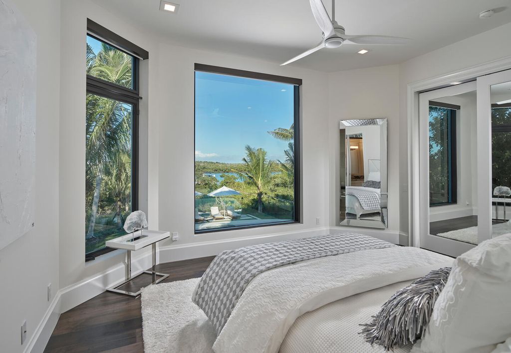 The Home on Marco Island is a Incredible island sanctuary nestled along the natural shoreline of Barfield Bay now available for sale. This home located at 899 Caxambas Dr, Marco Island, Florida; offering 5 bedrooms and 5 bathrooms with over 6,000 square feet of living spaces.