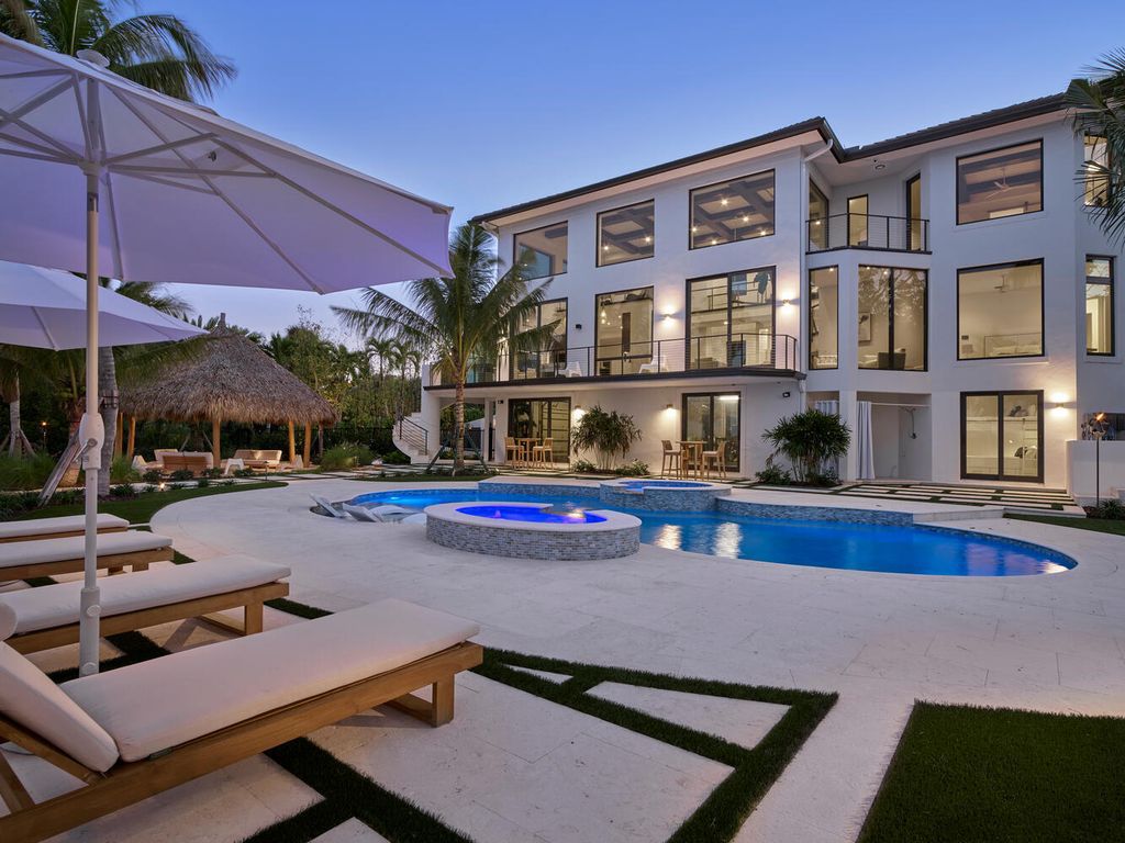 The Home on Marco Island is a Incredible island sanctuary nestled along the natural shoreline of Barfield Bay now available for sale. This home located at 899 Caxambas Dr, Marco Island, Florida; offering 5 bedrooms and 5 bathrooms with over 6,000 square feet of living spaces.