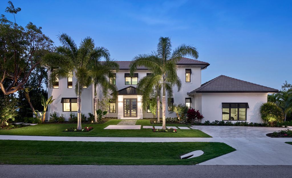 The Home on Marco Island is a Incredible island sanctuary nestled along the natural shoreline of Barfield Bay now available for sale. This home located at 899 Caxambas Dr, Marco Island, Florida; offering 5 bedrooms and 5 bathrooms with over 6,000 square feet of living spaces.