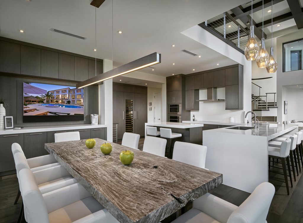 The Home on Marco Island is a Incredible island sanctuary nestled along the natural shoreline of Barfield Bay now available for sale. This home located at 899 Caxambas Dr, Marco Island, Florida; offering 5 bedrooms and 5 bathrooms with over 6,000 square feet of living spaces.