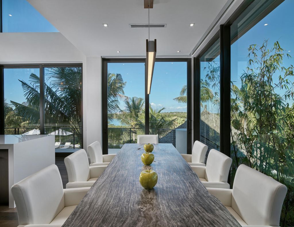 The Home on Marco Island is a Incredible island sanctuary nestled along the natural shoreline of Barfield Bay now available for sale. This home located at 899 Caxambas Dr, Marco Island, Florida; offering 5 bedrooms and 5 bathrooms with over 6,000 square feet of living spaces.
