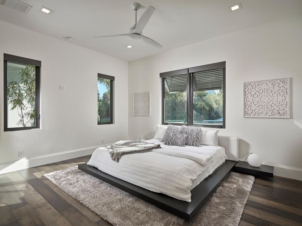 The Home on Marco Island is a Incredible island sanctuary nestled along the natural shoreline of Barfield Bay now available for sale. This home located at 899 Caxambas Dr, Marco Island, Florida; offering 5 bedrooms and 5 bathrooms with over 6,000 square feet of living spaces.