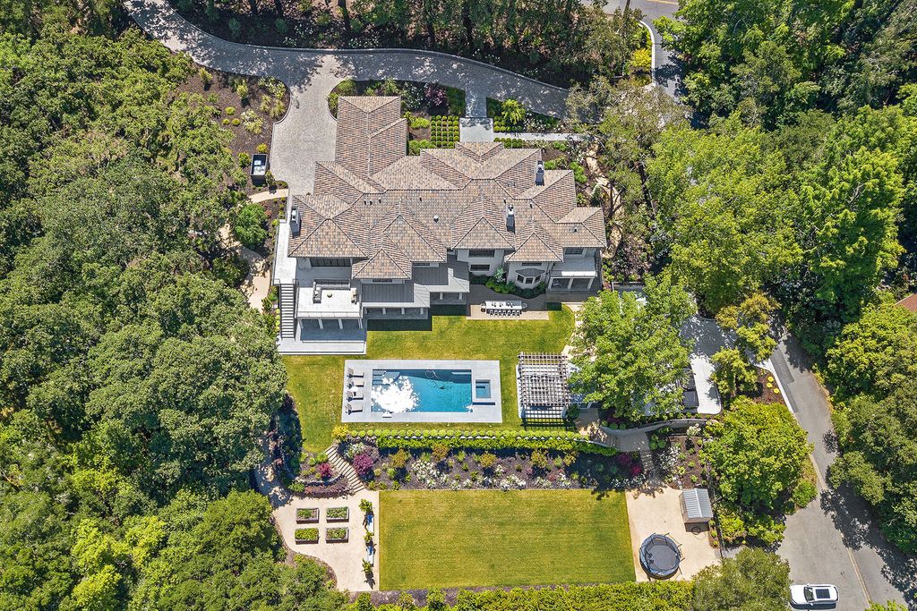 The Home in Orinda is a resort like estate where perfect design meets exquisite taste and unparalleled craftsmanship now available for sale. This home located at 519 Miner Rd, Orinda, California; offering 5 bedrooms and 9 bathrooms with over 7,000 square feet of living spaces. 
