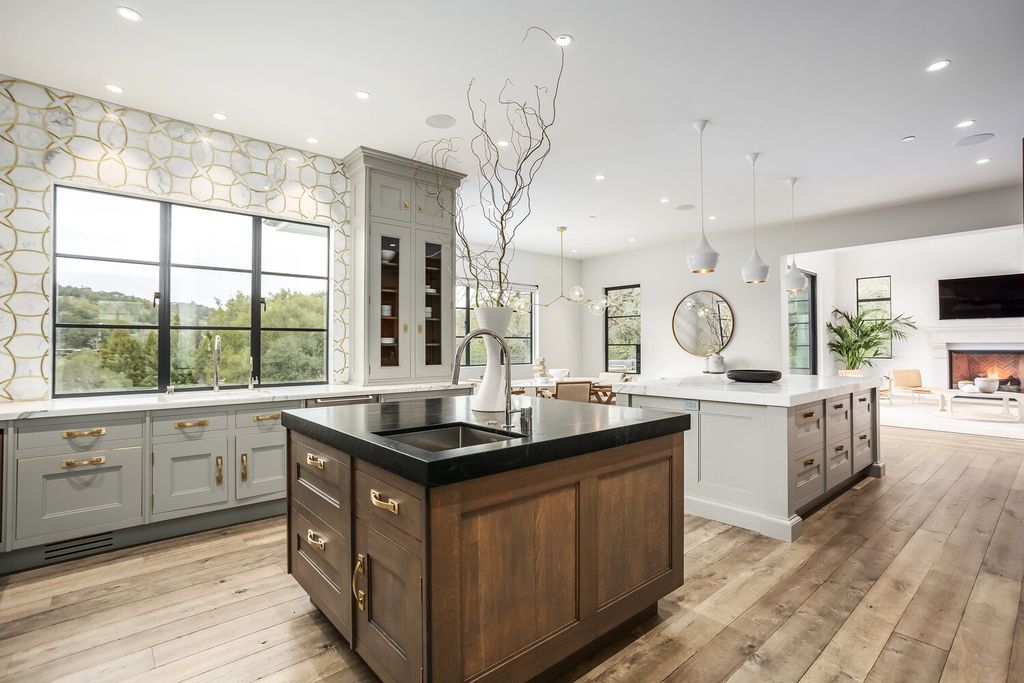 The Home in Orinda is a resort like estate where perfect design meets exquisite taste and unparalleled craftsmanship now available for sale. This home located at 519 Miner Rd, Orinda, California; offering 5 bedrooms and 9 bathrooms with over 7,000 square feet of living spaces. 