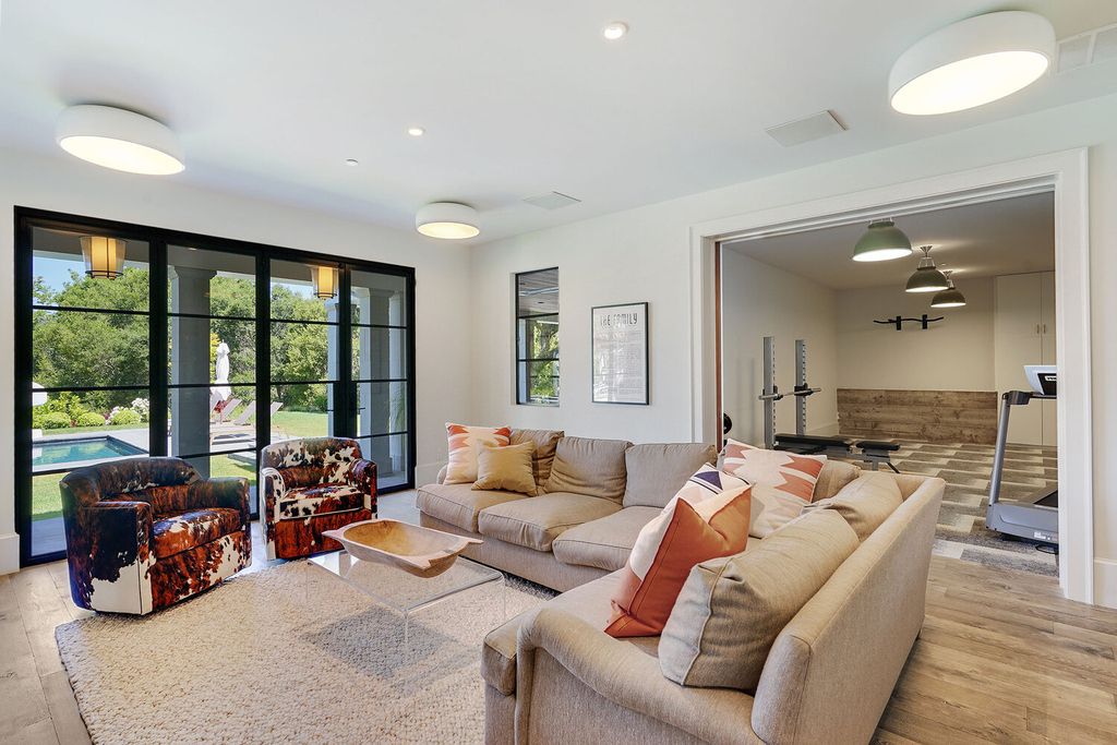 The Home in Orinda is a resort like estate where perfect design meets exquisite taste and unparalleled craftsmanship now available for sale. This home located at 519 Miner Rd, Orinda, California; offering 5 bedrooms and 9 bathrooms with over 7,000 square feet of living spaces. 
