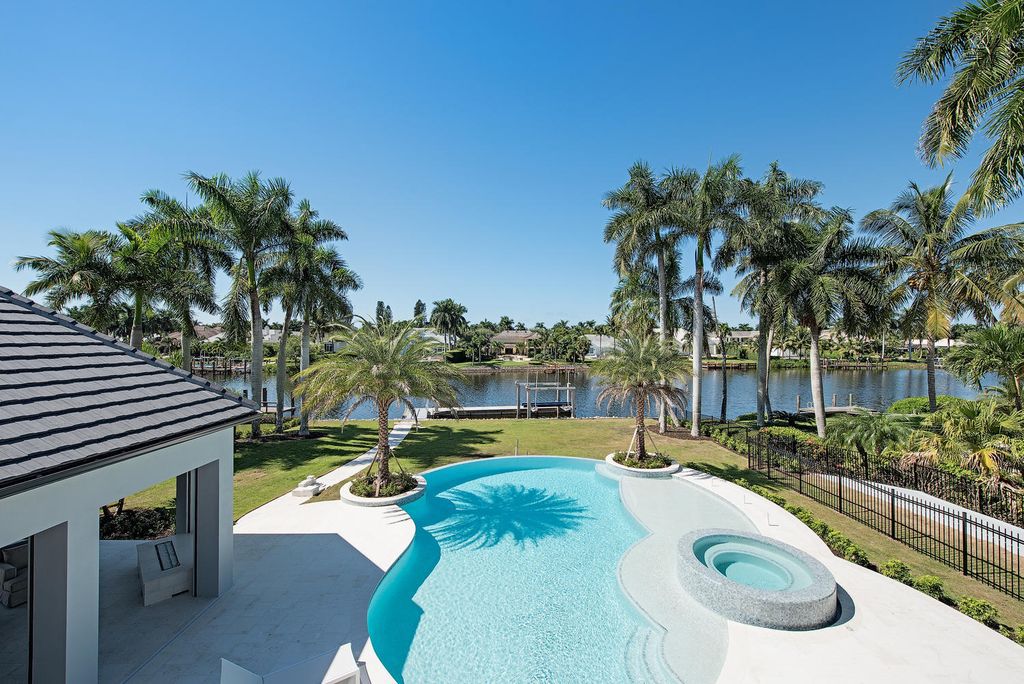 The Naples Home is a classical, lightly lived-in estate with extensive outdoor patios and landscaping finish off the tropical exterior now available for sale. This home located at 1200 Galleon Dr, Naples, Florida; offering 6 bedrooms and 12 bathrooms with over 7,700 square feet of living spaces