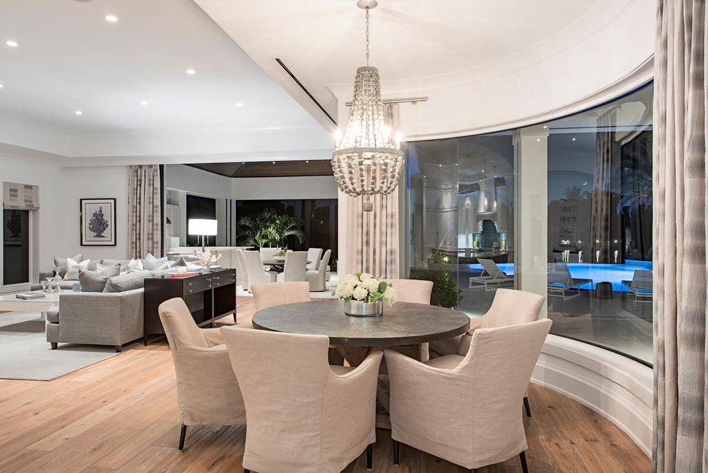 The Naples Home is a classical, lightly lived-in estate with extensive outdoor patios and landscaping finish off the tropical exterior now available for sale. This home located at 1200 Galleon Dr, Naples, Florida; offering 6 bedrooms and 12 bathrooms with over 7,700 square feet of living spaces