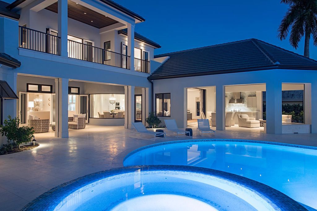 The Naples Home is a classical, lightly lived-in estate with extensive outdoor patios and landscaping finish off the tropical exterior now available for sale. This home located at 1200 Galleon Dr, Naples, Florida; offering 6 bedrooms and 12 bathrooms with over 7,700 square feet of living spaces
