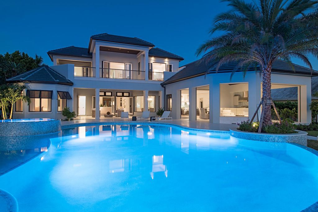 The Naples Home is a classical, lightly lived-in estate with extensive outdoor patios and landscaping finish off the tropical exterior now available for sale. This home located at 1200 Galleon Dr, Naples, Florida; offering 6 bedrooms and 12 bathrooms with over 7,700 square feet of living spaces