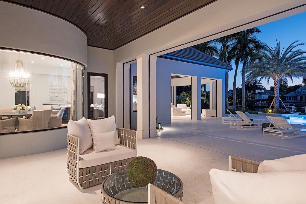 The Naples Home is a classical, lightly lived-in estate with extensive outdoor patios and landscaping finish off the tropical exterior now available for sale. This home located at 1200 Galleon Dr, Naples, Florida; offering 6 bedrooms and 12 bathrooms with over 7,700 square feet of living spaces