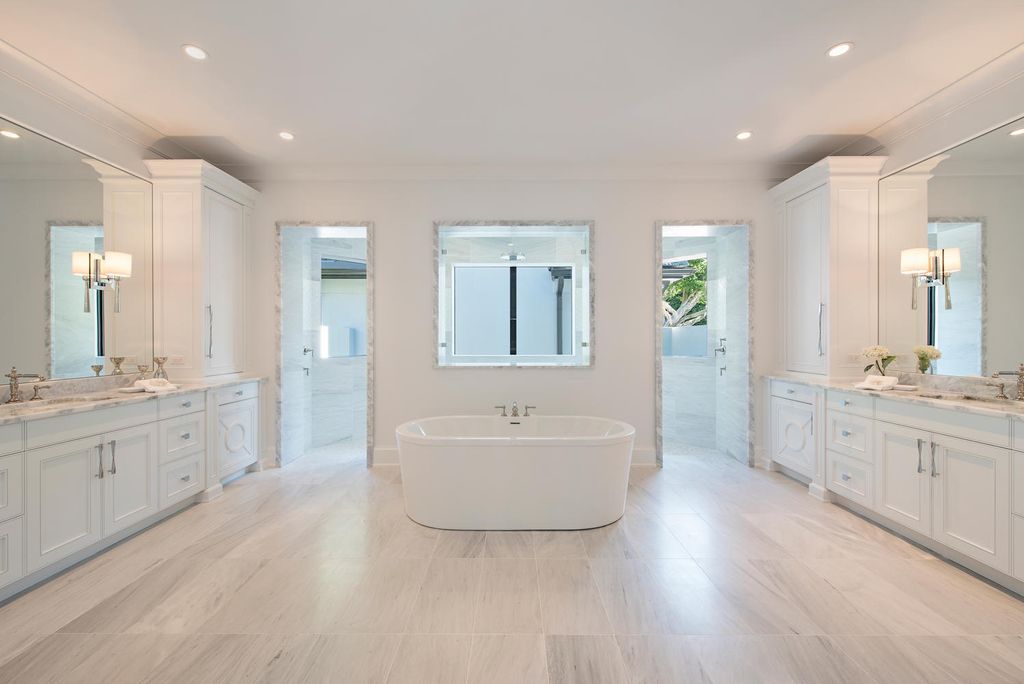 The Naples Home is a classical, lightly lived-in estate with extensive outdoor patios and landscaping finish off the tropical exterior now available for sale. This home located at 1200 Galleon Dr, Naples, Florida; offering 6 bedrooms and 12 bathrooms with over 7,700 square feet of living spaces