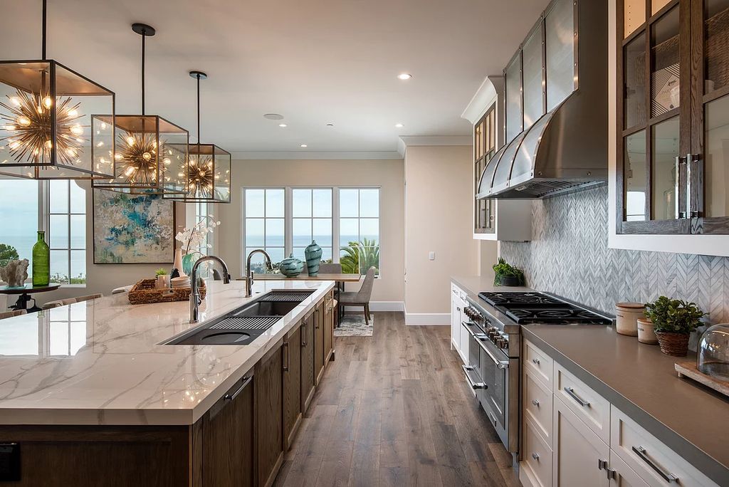The Home in La Jolla is a Brand new construction on Muirlands Drive with panoramic ocean, village, and golf course views now available for sale. This home located at 1206 Muirlands Dr, La Jolla, California; offering 8 bedrooms and 8 bathrooms with over 7,700 square feet of living spaces.