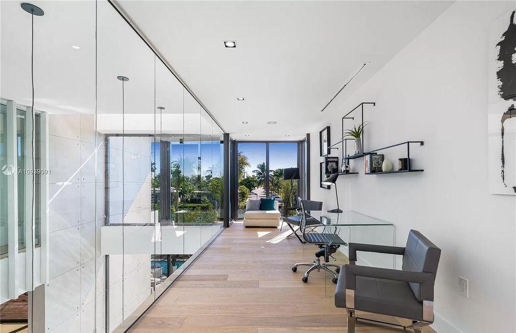 The Miami Beach Home is a new construction modern masterpiece located within the serene gated community of Normandy Isle now available for sale. This home located at 770 S Shore Dr, Miami Beach, Florida; offering 4 bedrooms and 5 bathrooms with over 5,000 square feet of living spaces.
