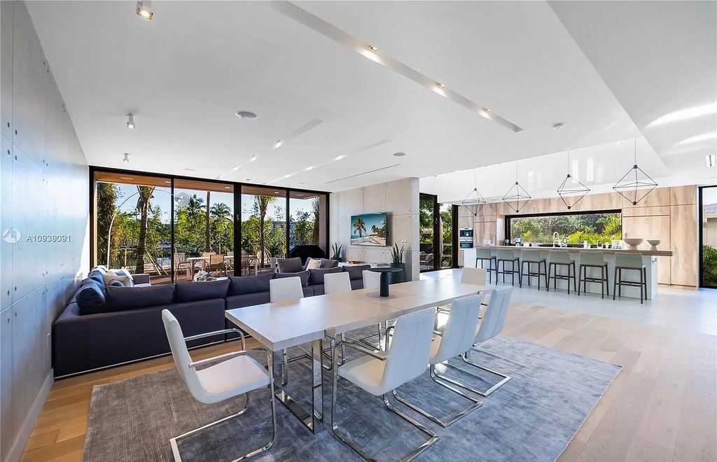 The Miami Beach Home is a new construction modern masterpiece located within the serene gated community of Normandy Isle now available for sale. This home located at 770 S Shore Dr, Miami Beach, Florida; offering 4 bedrooms and 5 bathrooms with over 5,000 square feet of living spaces.