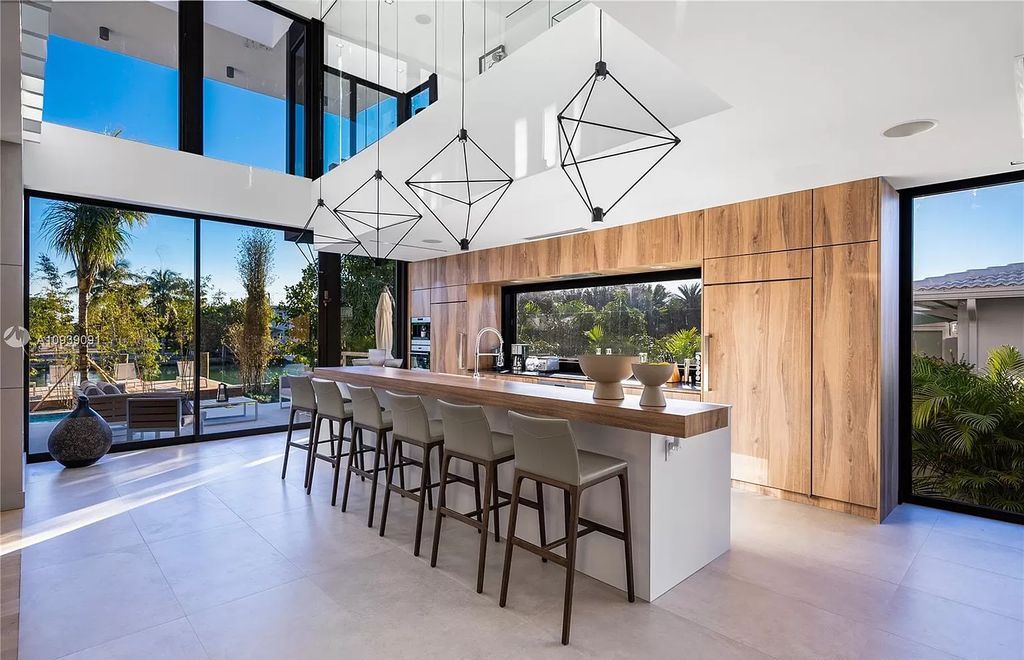 The Miami Beach Home is a new construction modern masterpiece located within the serene gated community of Normandy Isle now available for sale. This home located at 770 S Shore Dr, Miami Beach, Florida; offering 4 bedrooms and 5 bathrooms with over 5,000 square feet of living spaces.