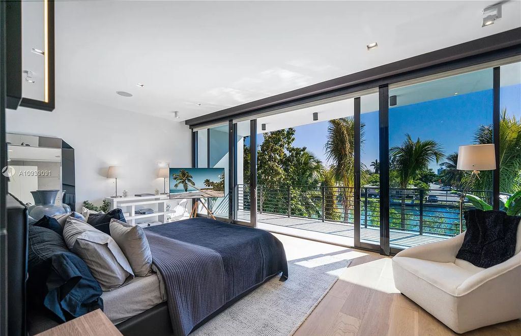 The Miami Beach Home is a new construction modern masterpiece located within the serene gated community of Normandy Isle now available for sale. This home located at 770 S Shore Dr, Miami Beach, Florida; offering 4 bedrooms and 5 bathrooms with over 5,000 square feet of living spaces.