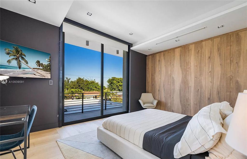 The Miami Beach Home is a new construction modern masterpiece located within the serene gated community of Normandy Isle now available for sale. This home located at 770 S Shore Dr, Miami Beach, Florida; offering 4 bedrooms and 5 bathrooms with over 5,000 square feet of living spaces.