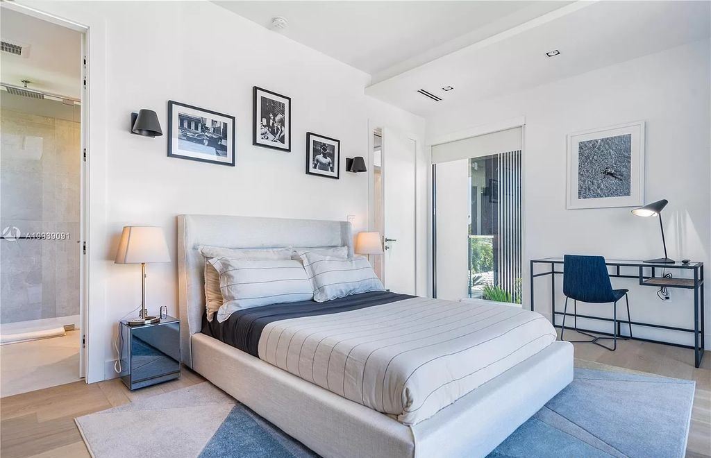 The Miami Beach Home is a new construction modern masterpiece located within the serene gated community of Normandy Isle now available for sale. This home located at 770 S Shore Dr, Miami Beach, Florida; offering 4 bedrooms and 5 bathrooms with over 5,000 square feet of living spaces.