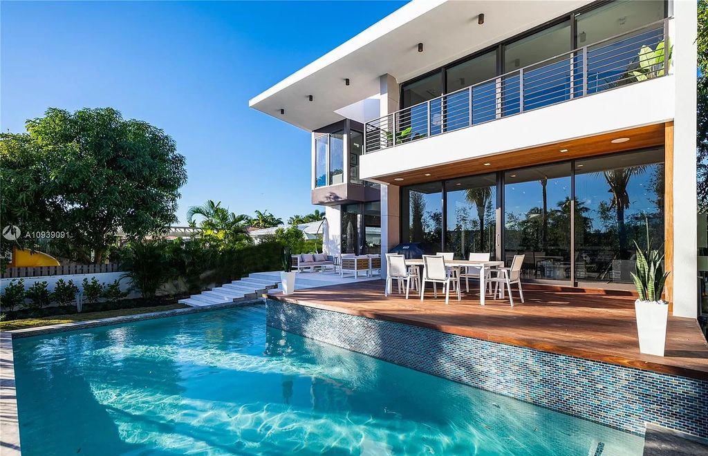 The Miami Beach Home is a new construction modern masterpiece located within the serene gated community of Normandy Isle now available for sale. This home located at 770 S Shore Dr, Miami Beach, Florida; offering 4 bedrooms and 5 bathrooms with over 5,000 square feet of living spaces.