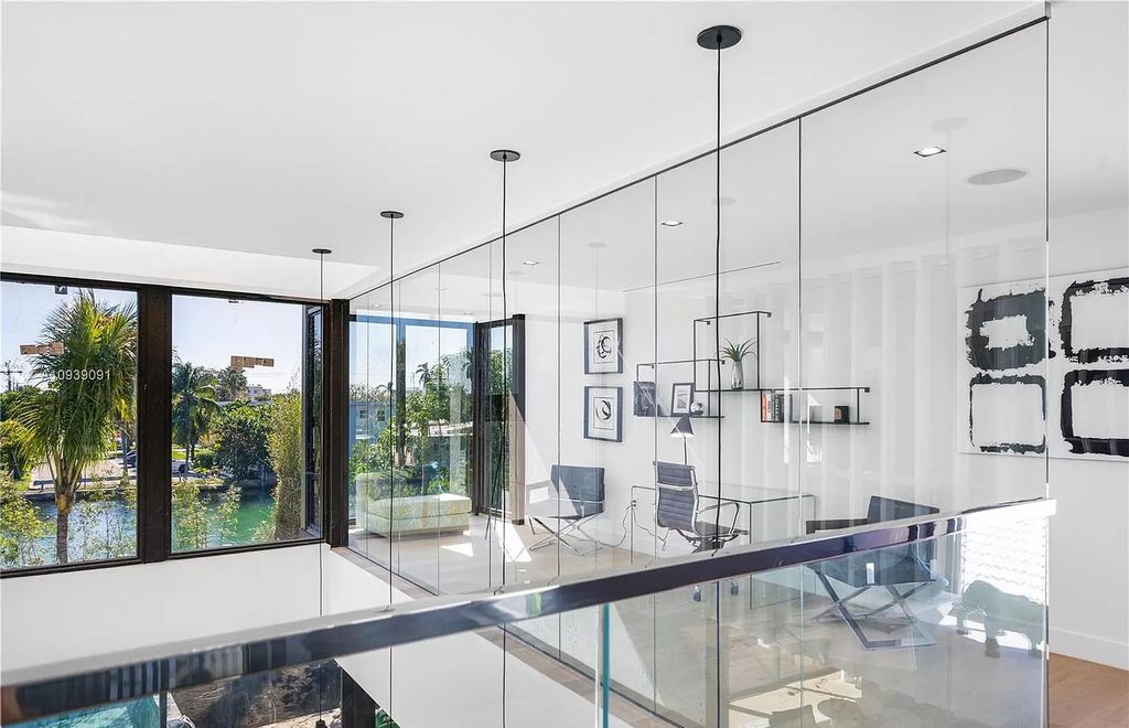 The Miami Beach Home is a new construction modern masterpiece located within the serene gated community of Normandy Isle now available for sale. This home located at 770 S Shore Dr, Miami Beach, Florida; offering 4 bedrooms and 5 bathrooms with over 5,000 square feet of living spaces.