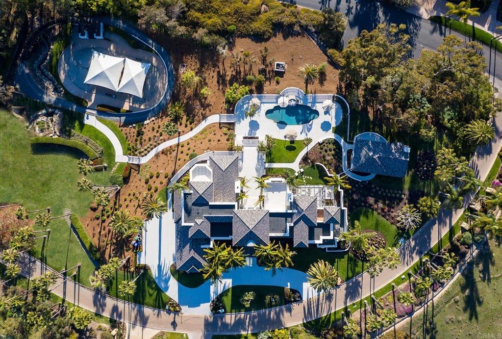 The Rancho Santa Fe Mediterranean Home is a luxurious property with breathtaking sunsets and panoramic views to the ocean now available for sale. This home located at 6823 Spyglass Ln, Rancho Santa Fe, California; offering 6 bedrooms and 7 bathrooms with over 7,300 square feet of living spaces.