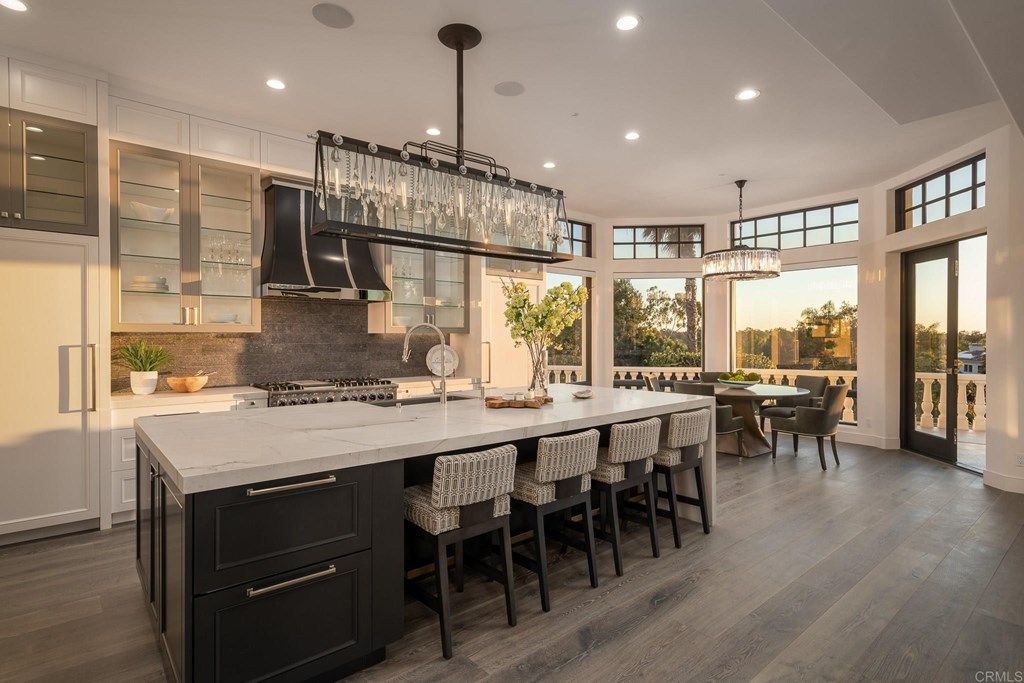 The Rancho Santa Fe Mediterranean Home is a luxurious property with breathtaking sunsets and panoramic views to the ocean now available for sale. This home located at 6823 Spyglass Ln, Rancho Santa Fe, California; offering 6 bedrooms and 7 bathrooms with over 7,300 square feet of living spaces.