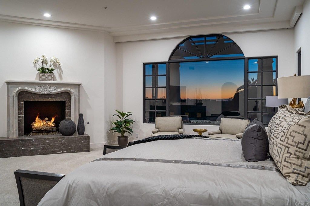 The Rancho Santa Fe Mediterranean Home is a luxurious property with breathtaking sunsets and panoramic views to the ocean now available for sale. This home located at 6823 Spyglass Ln, Rancho Santa Fe, California; offering 6 bedrooms and 7 bathrooms with over 7,300 square feet of living spaces.