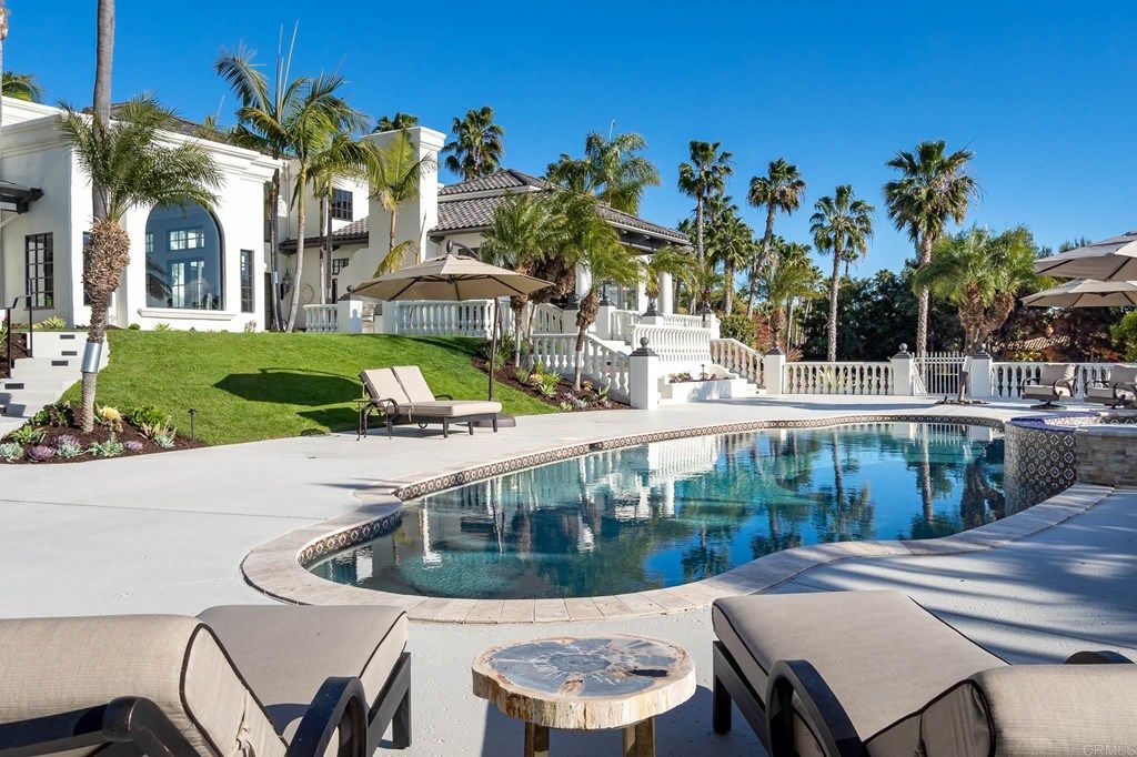 The Rancho Santa Fe Mediterranean Home is a luxurious property with breathtaking sunsets and panoramic views to the ocean now available for sale. This home located at 6823 Spyglass Ln, Rancho Santa Fe, California; offering 6 bedrooms and 7 bathrooms with over 7,300 square feet of living spaces.