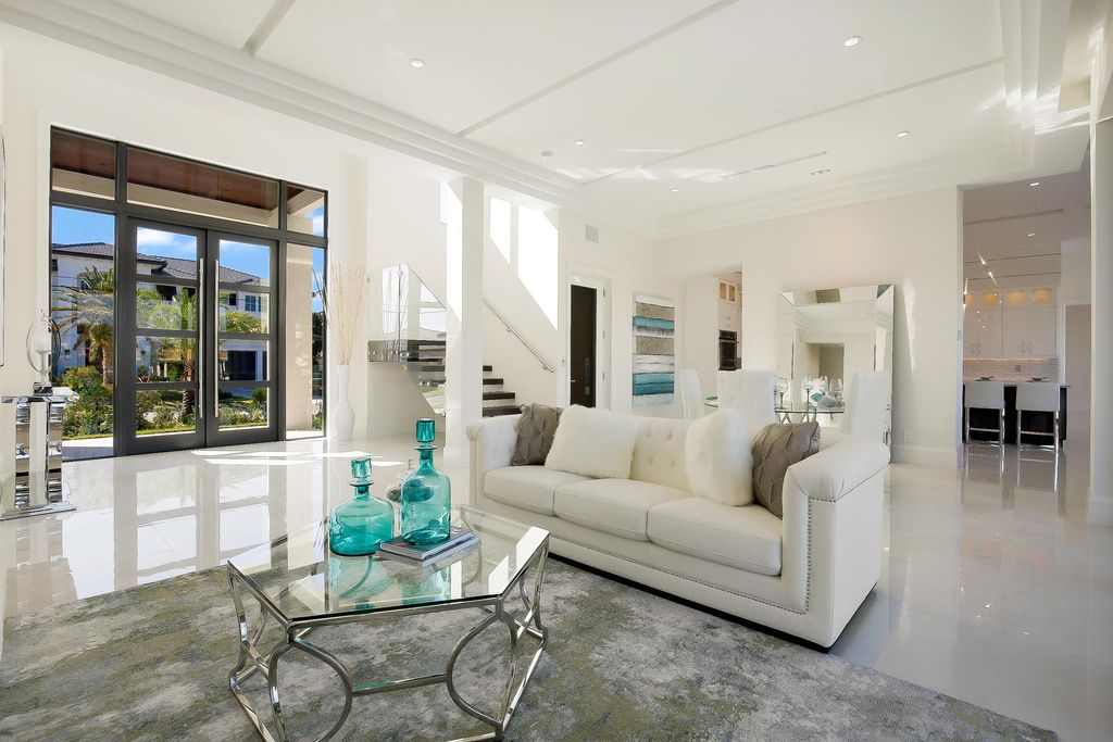The Florida Waterfront Home is an exceptional estate with immaculate contemporary finishes designed by Zahn Builders now available for sale. This home located at 2431 NE 32nd Ct, Lighthouse Point, Florida; offering 5 bedrooms and 6 bathrooms with over 5,600 square feet of living spaces.