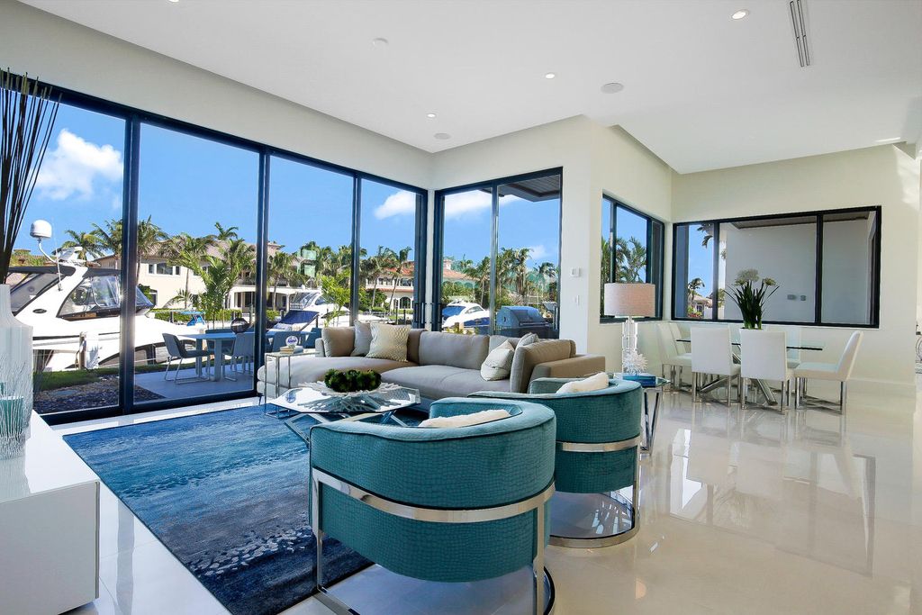 The Florida Waterfront Home is an exceptional estate with immaculate contemporary finishes designed by Zahn Builders now available for sale. This home located at 2431 NE 32nd Ct, Lighthouse Point, Florida; offering 5 bedrooms and 6 bathrooms with over 5,600 square feet of living spaces.