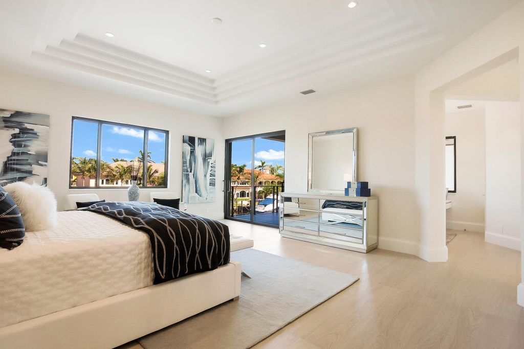 The Florida Waterfront Home is an exceptional estate with immaculate contemporary finishes designed by Zahn Builders now available for sale. This home located at 2431 NE 32nd Ct, Lighthouse Point, Florida; offering 5 bedrooms and 6 bathrooms with over 5,600 square feet of living spaces.