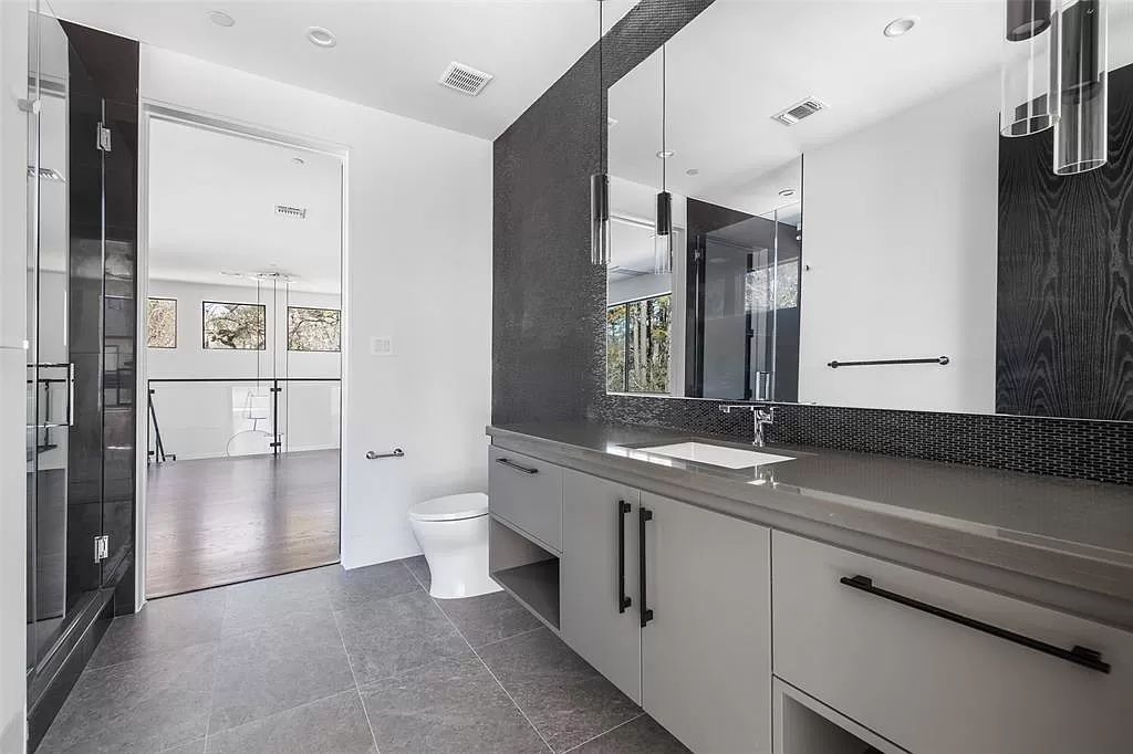 The Home in Houston built by famed Capital Builders is a bold exploration of an immersive indoor-outdoor floor plan now available for sale. This home located at 3 Concord Cir, Houston, Texas; offering 5 bedrooms and 5 bathrooms with over 7,400 square feet of living spaces.