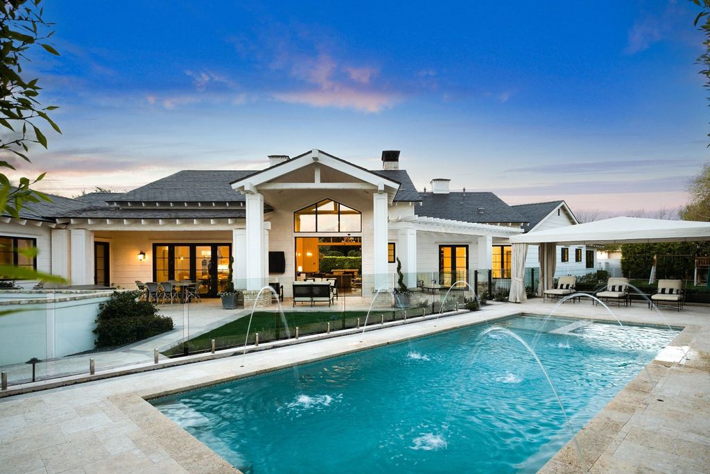 The Scottsdale Home is a exclusive privately gated estate with Camelback Mountain views and first class timeless finishes now available for sale. This home located at 6426 E Exeter Blvd, Scottsdale, Arizona; offering 4 bedrooms and 7 bathrooms with over 7,600 square feet of living spaces.