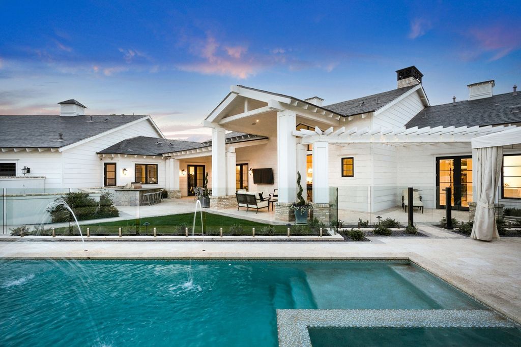 The Scottsdale Home is a exclusive privately gated estate with Camelback Mountain views and first class timeless finishes now available for sale. This home located at 6426 E Exeter Blvd, Scottsdale, Arizona; offering 4 bedrooms and 7 bathrooms with over 7,600 square feet of living spaces.