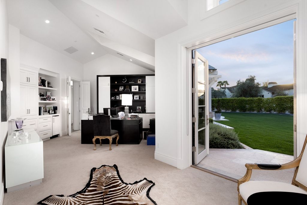 The Scottsdale Home is a exclusive privately gated estate with Camelback Mountain views and first class timeless finishes now available for sale. This home located at 6426 E Exeter Blvd, Scottsdale, Arizona; offering 4 bedrooms and 7 bathrooms with over 7,600 square feet of living spaces.