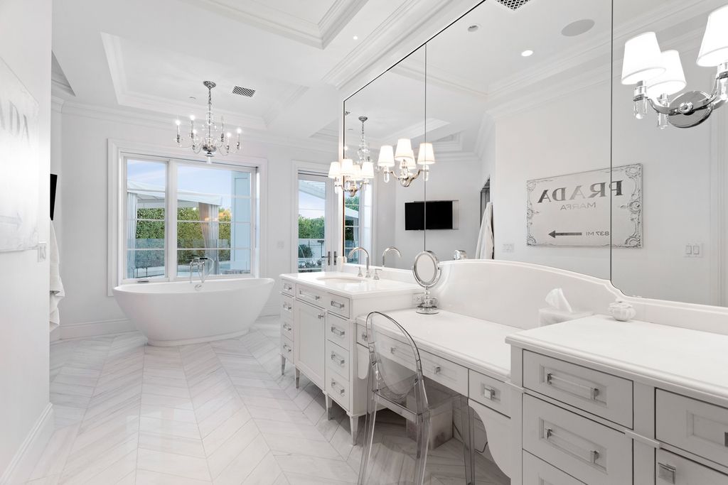 The Scottsdale Home is a exclusive privately gated estate with Camelback Mountain views and first class timeless finishes now available for sale. This home located at 6426 E Exeter Blvd, Scottsdale, Arizona; offering 4 bedrooms and 7 bathrooms with over 7,600 square feet of living spaces.