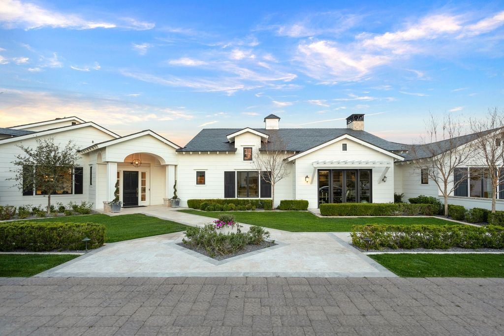 The Scottsdale Home is a exclusive privately gated estate with Camelback Mountain views and first class timeless finishes now available for sale. This home located at 6426 E Exeter Blvd, Scottsdale, Arizona; offering 4 bedrooms and 7 bathrooms with over 7,600 square feet of living spaces.
