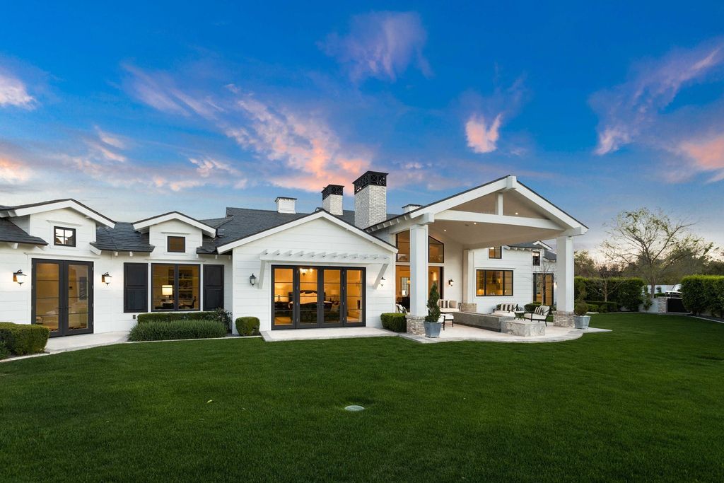 The Scottsdale Home is a exclusive privately gated estate with Camelback Mountain views and first class timeless finishes now available for sale. This home located at 6426 E Exeter Blvd, Scottsdale, Arizona; offering 4 bedrooms and 7 bathrooms with over 7,600 square feet of living spaces.