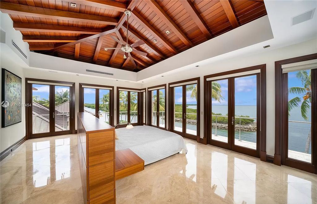 The Miami Waterfront Home is an outstanding residence offers total privacy and stunning water views with oversized pool now available for sale. This home located at 400 S Mashta Dr, Key Biscayne, Florida; offering 6 bedrooms and 7 bathrooms with over 8,200 square feet of living spaces