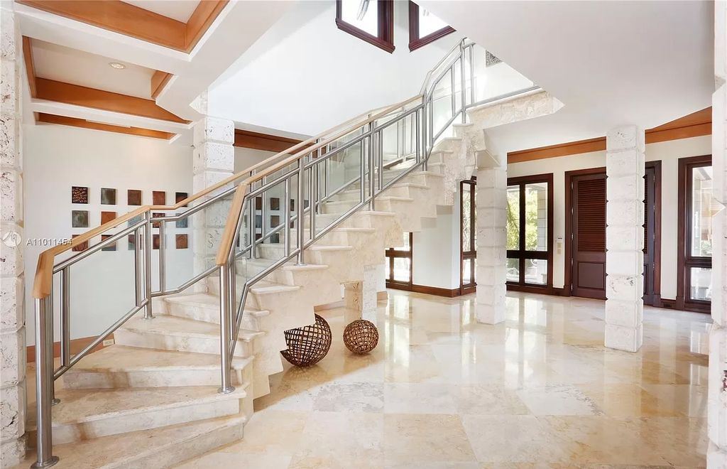 The Miami Waterfront Home is an outstanding residence offers total privacy and stunning water views with oversized pool now available for sale. This home located at 400 S Mashta Dr, Key Biscayne, Florida; offering 6 bedrooms and 7 bathrooms with over 8,200 square feet of living spaces