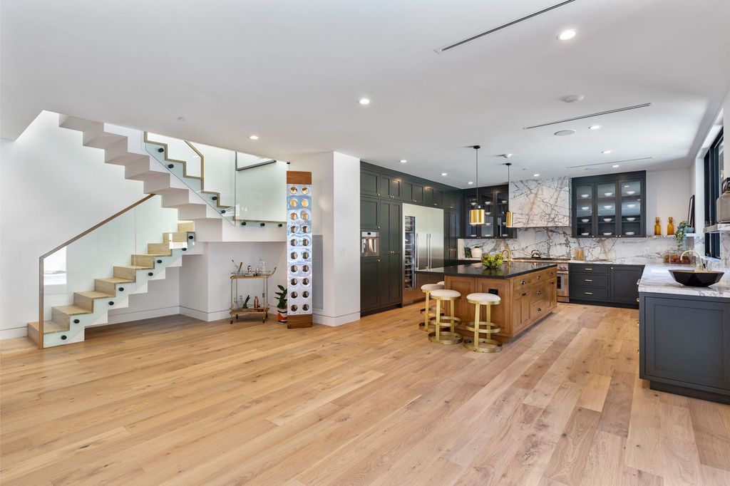 The Beverly Hills Home is a magnificent newly completed architectural residence with great volume and scale now available for sale. This home located at 2220 Coldwater Canyon Dr, Beverly Hills, California; offering 4 bedrooms and 5 bathrooms with over 4,200 square feet of living spaces.