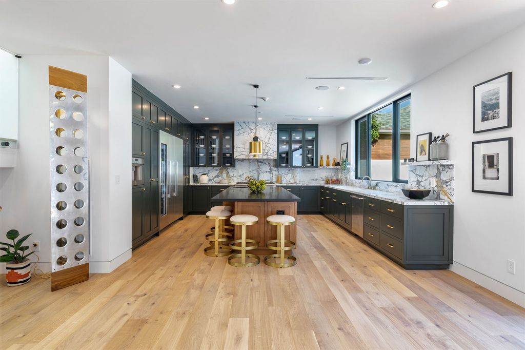 The Beverly Hills Home is a magnificent newly completed architectural residence with great volume and scale now available for sale. This home located at 2220 Coldwater Canyon Dr, Beverly Hills, California; offering 4 bedrooms and 5 bathrooms with over 4,200 square feet of living spaces.