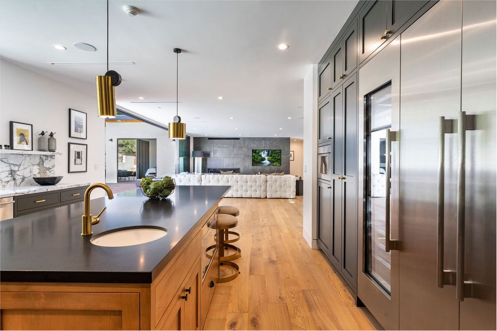 The Beverly Hills Home is a magnificent newly completed architectural residence with great volume and scale now available for sale. This home located at 2220 Coldwater Canyon Dr, Beverly Hills, California; offering 4 bedrooms and 5 bathrooms with over 4,200 square feet of living spaces.